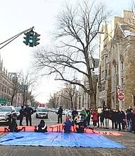 eople blocked an intersection during a demonstration on Friday in favor of changing the name of Yale’s Calhoun College. (PETER HVIZDAK / NEW HAVEN REGISTER, VIA ASSOCIATED PRESS)