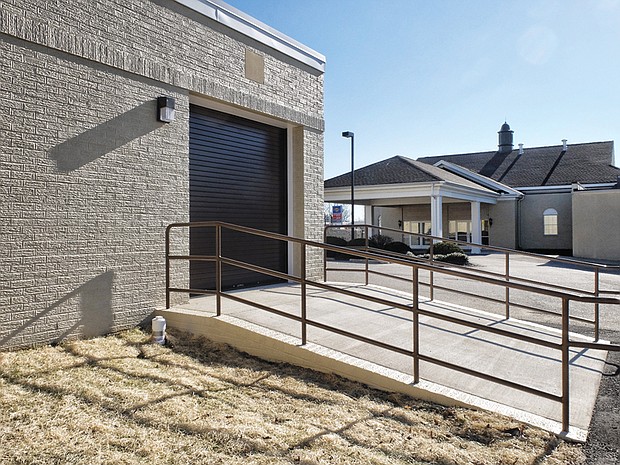 Funeral home’s new addition // The facility, which opened last week and cost about $450,000, is located across the parking lot from the funeral home’s chapel. 