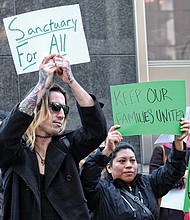 Rallying for ‘sanctuary’ // With signs and chants, more than 100 immigration advocates rally Monday afternoon outside City Hall to urge Richmond Mayor Levar M. Stoney and the Richmond City Council to declare Richmond a “sanctuary city” and defy stepped-up federal efforts to deport people who lack green cards or student, work or visitation visas. 
Later, advocates pushed their view during the public comment session of the evening’s council meeting.
So far, they have not moved government leaders, including the mayor, who has avoided using the “sanctuary” term. 
