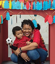 Under a pagoda //
Xavier Judon, 2, and his mother, Melissa, strike a playful pose under a handcrafted pagoda set up for last Saturday’s ChinaFest! Year of the Fire Rooster. The family-oriented event took place at the Virginia Museum of Fine Arts. Please see more photos, B2.