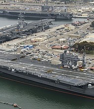 The United States deployed the aircraft carrier USS Carl Vinson to the disputed waters of the South China Sea on Saturday as part of maritime "routine operations." CREDIT: Spec. 2nd Class Daniel M. Young/U.S. Navy
