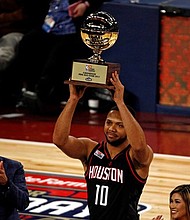 New Orleans, LA, USA; Houston Rockets guard Eric Gordon (10) celebrates winning the three-point contest during NBA All-Star Saturday Night at Smoothie King Center. Mandatory Credit: Derick E. Hingle-USA TODAY Sports
(Photo: Derick E. Hingle, Derick E. Hingle)
