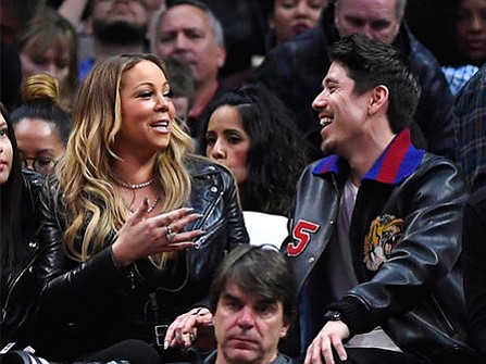 Mariah Carey and backup dancer Bryan Tanaka