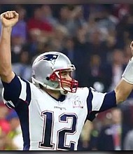 New England Patriots quarterback Tom Brady (12) celebrates the game-tying two-point conversion against the Atlanta Falcons in the fourth quarter during Super Bowl LI at NRG Stadium. (Photo: Mark J. Rebilas, USA TODAY Sports)