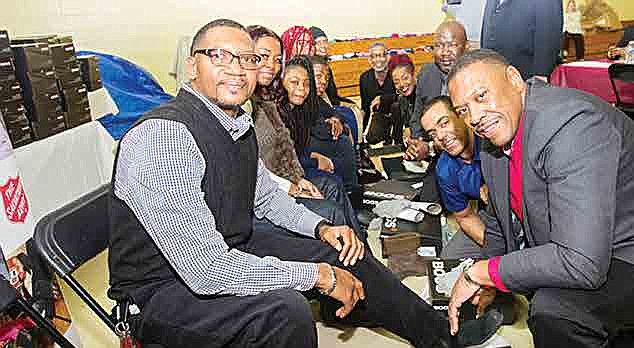 On Feb. 4, more than 200 low-income and homeless residents of greater Baltimore received new boots and socks from Toyota Financial Services. The event took place at The Salvation Army Boys and Girls Club at Middle River. Right Side from Front to Back: John Ridgeway of Toyota Financial Services, Jade Merrick of Toyota Financial Services, Tim Hale of Toyota Financial Services, the comedian.