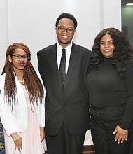 
President Rahmah T. Johnson, left, and Edwina Richmond, right, scholarship committee chair of the Virginia Area Chapter of Pi Lambda Theta International Honor Society and Professional Association in Education, with student winners, from left, Jaelynn Scott, DaRon Lightfoot and Ericka Black.