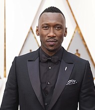 Mahershala Ali appears on the red carpet of the Academy Awards in Los Angeles before winning his first Oscar.