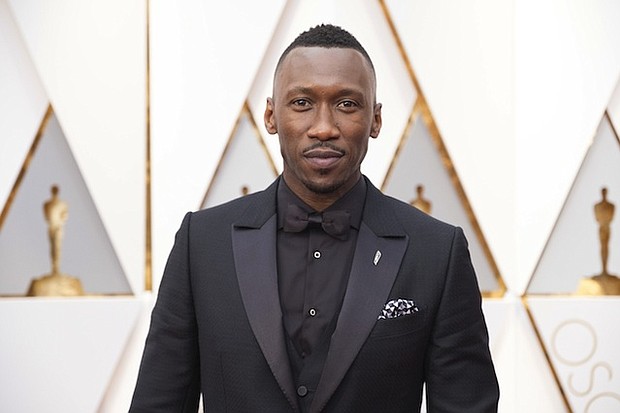 Mahershala Ali appears on the red carpet of the Academy Awards in Los Angeles before winning his first Oscar.