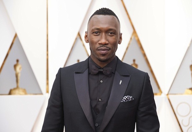Mahershala Ali appears on the red carpet of the Academy Awards in Los Angeles before winning his first Oscar.
