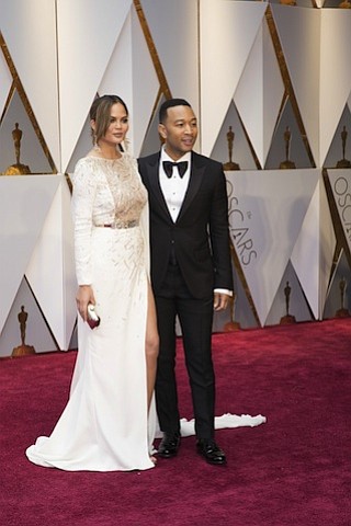 	Chrissy Teigen and John Legend