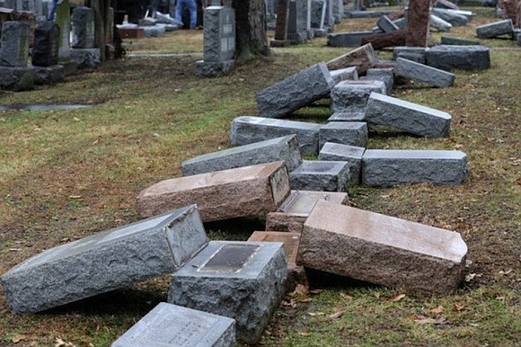 Between 75 and 100 tombstones were overturned and damaged Saturday night at a Jewish cemetery in Philadelphia, police said Sunday.