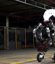 	Boston Dynamics, the Google-owned robotics company officially unveiled its latest robot, Handle, in a YouTube video posted Wednesday that immediately captivated the Internet. Handle, which stands 6-foot-6, looks vaguely human with a torso, arms and legs that have wheels instead of feet.