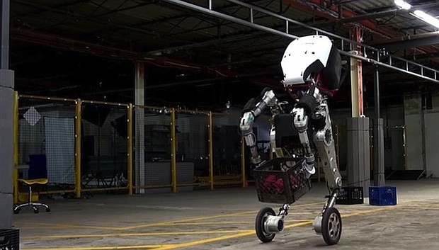 	Boston Dynamics, the Google-owned robotics company officially unveiled its latest robot, Handle, in a YouTube video posted Wednesday that immediately captivated the Internet. Handle, which stands 6-foot-6, looks vaguely human with a torso, arms and legs that have wheels instead of feet.