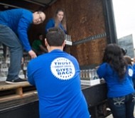 Mission Arlington's food pantry, community closet, and library have been restocked, organized and spruced up, with the help from Texas Trust Credit Union employees.