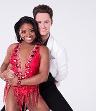 Simone Biles with her partner Sasha Farber