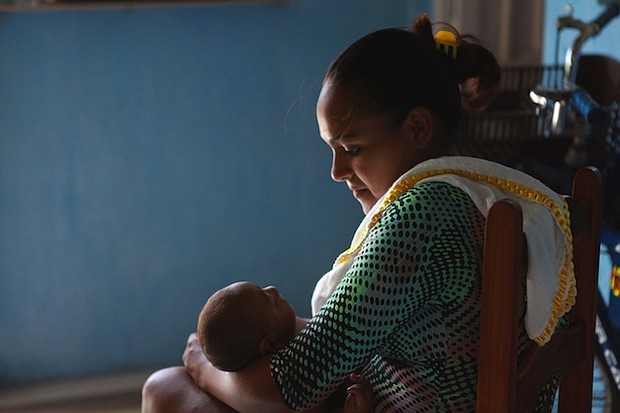 A Brazilian mother, Rafela Santos, is seen here holding her son Luiz Felipe on January 26, 2016 in Recife, Brazil. Her son was born with microcephaly.