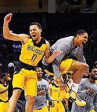 The Bowie State Bulldogs celebrate their 62-54 championship victory over Fayetteville State University last Saturday.
