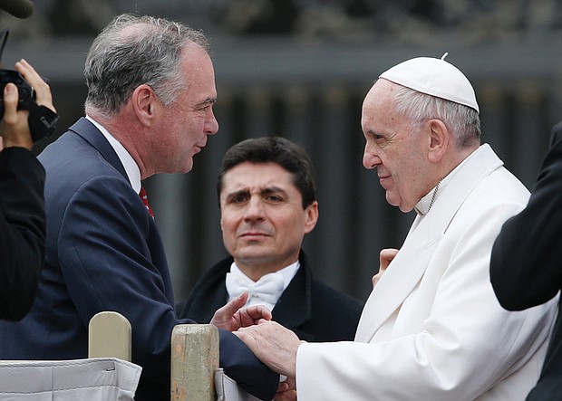 
U.S. Sen. Tim Kaine talks with Pope Francis during a general audience Feb. 21 at the Vatican.