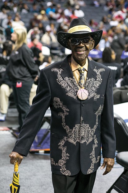 
Mr. CIAA, Abraham “Ham” Mitchell of Suffolk, sports one of his custom outfits around the arena in Charlotte. The colors are those of the Bowie State Bulldogs.