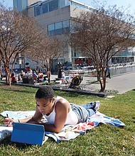 
Johnetta Jackson takes advantage of the unseasonably warm winter weather to study outdoors last week. Location: Virginia Museum of Fine Arts. Like many other Richmond area residents and visitors, the Virginia Commonwealth University student and personal trainer found a way to enjoy the unexpected winter warmth. High temperatures are expected to be in the chillier 50s heading into the weekend, but then warm up again into the 70s by Monday before beginning another run of cooler days.  