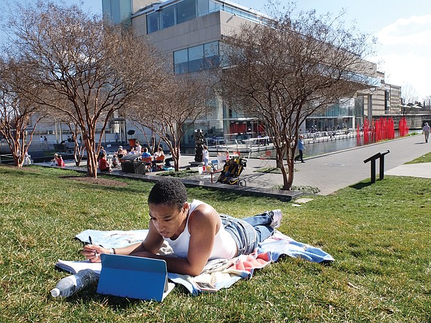 
Johnetta Jackson takes advantage of the unseasonably warm winter weather to study outdoors last week. Location: Virginia Museum of Fine Arts. Like many other Richmond area residents and visitors, the Virginia Commonwealth University student and personal trainer found a way to enjoy the unexpected winter warmth. High temperatures are expected to be in the chillier 50s heading into the weekend, but then warm up again into the 70s by Monday before beginning another run of cooler days.  