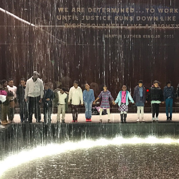 Photo courtesy of the Congressional Black Caucus Foundation //
Immersed in history //

Fifth-graders from Richmond’s Carver Elementary School join Principal Kiwana S. Yates and teachers around an indoor fountain at the Smithsonian National Museum of African American History and Culture in Washington. The students also visited the Congressional Black Caucus Foundation, which hosted the Feb. 22 trip in partnership with The New Y-CAPP, Youth Challenged Advised & Positively Promoted. At the foundation, they learned about efforts to advance the global black community and the separate work of members of the Congressional Black Caucus. The goal of the trip: To enable the students to gain a better understanding of the contributions of African-Americans. 
