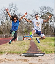 Kendra Scott and Jordin Poindexter, both juniors at Armstrong High School, show off their track skills after strong finishes in the State Indoor Track & Field Championships in Salem.