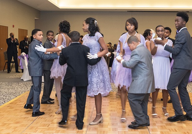 Ava Reaves
Jack and Jill Cotillion
Teens in the James River Chapter of Jack and Jill of America Inc. enjoy a special dance at the organization’s 5th Annual Richmond Renaissance Cotillion last Saturday at the Claude G. Perkins Living and Learning Center at Virginia Union University. The theme: Springtime in Paris. Twenty middle school students participated in events leading up to the cotillion, all of which were designed to build confidence through interpersonal and communication skills, etiquette, ballroom dance, community service and social activities. 