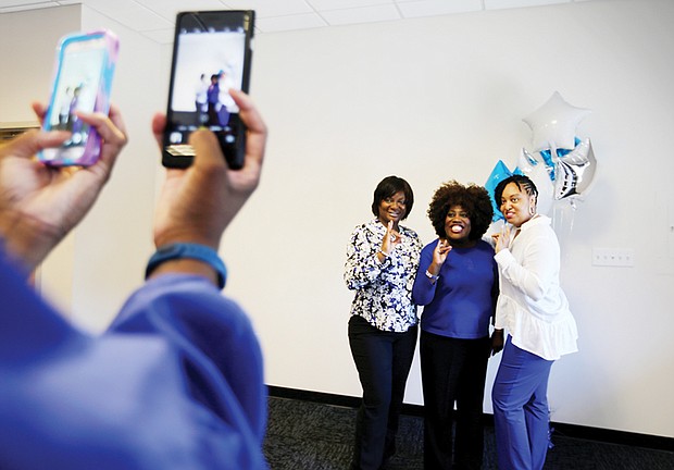 Fun times //
Comedian Sheryl Underwood, center, smiles for photos with sorors Sherry Crawley, left, and Jillian Mayers of Zeta Phi Beta Sorority on Saturday in Glen Allen. Members of the sorority’s Sigma Delta Zeta Chapter hosted a brunch for Ms. Underwood, who was in town to perform at the Funny Bone comedy club. Ms. Underwood, a host of the CBS show “The Talk,” served as the 23rd International Grand Basileus of Zeta Phi Beta Sorority in 2008. She pledged in 1990.