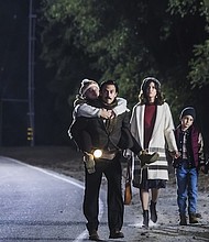 The Pearsons take a Thanksgiving stroll after a disastrous day in "This Is Us."
