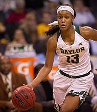 Baylor Bears forward Nina Davis (13) dribbles the ball during the second quarter against the West Virginia Mountaineers during the women's Big 12 Conference Tournament at Chesapeake Energy Arena. Rob Ferguson-USA TODAY Sports
(Photo: Rob Ferguson, Rob Ferguson)