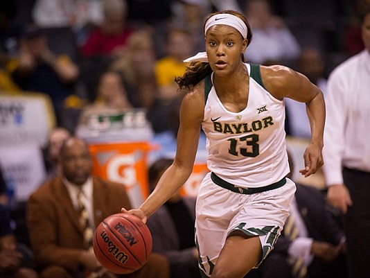 Baylor Bears forward Nina Davis (13) dribbles the ball during the second quarter against the West Virginia Mountaineers during the women's Big 12 Conference Tournament at Chesapeake Energy Arena. Rob Ferguson-USA TODAY Sports
(Photo: Rob Ferguson, Rob Ferguson)