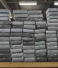 Authorities are detailing the great lengths suspected drug smugglers went to in order to conceal their operation after $4.1 million in cash and more than six pounds of heroin were seized by federal agents at a New York storage facility over the weekend.