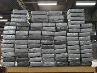 Authorities are detailing the great lengths suspected drug smugglers went to in order to conceal their operation after $4.1 million in cash and more than six pounds of heroin were seized by federal agents at a New York storage facility over the weekend.