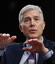 Judge Neil Gorsuch responds to questions Tuesday during his U.S. Supreme Court confirmation hearings before the Senate Judiciary Committee. He was grilled for three days.