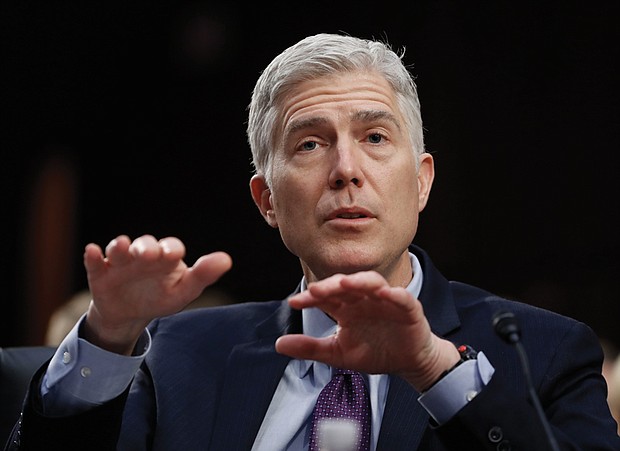 Judge Neil Gorsuch responds to questions Tuesday during his U.S. Supreme Court confirmation hearings before the Senate Judiciary Committee. He was grilled for three days.