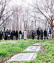 Standing together // In the wake of a rash of vandalism at Jewish cemeteries and community centers across the nation, more than 200 people attend a unity rally Sunday at Emek Sholom Holocaust Memorial Cemetery in Henrico County as a show of solidarity.
Speakers from several faith traditions participated in “Standing Together: Remember and Respond.” The event at the cemetery, located within Forest Lawn Cemetery, was designed to support those who have been targeted by recent events and to stand in unity against divisive and bigoted actions and rhetoric. 
Top, people line up to place stones on a monument to those who died in the Holocaust and whose remains were never found. Right, Ahmed Faried leaves stones on the site.

