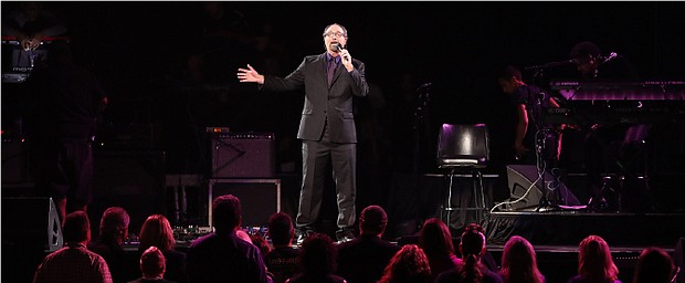 Bobby Z. speaks to the crowd during the “Official Prince Tribute-A Celebration of Life and Music,” concert at Xcel Energy Center on Oct. 13, 2016, in St. Paul, Minnesota. (Photo by Adam Bettcher/Getty Images)