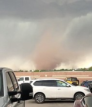 A tornado forms in Midland, Texas, on Tuesday, March 28, 2017.