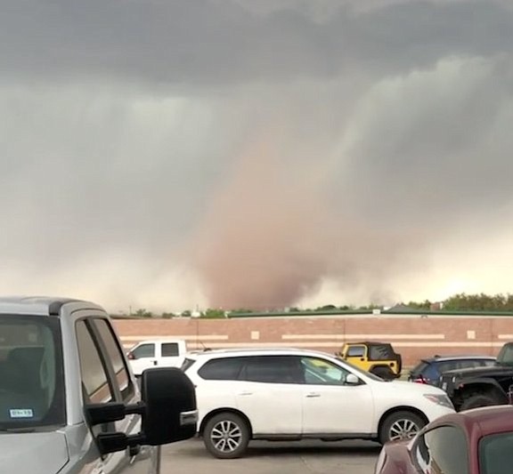 A tornado forms in Midland, Texas, on Tuesday, March 28, 2017.