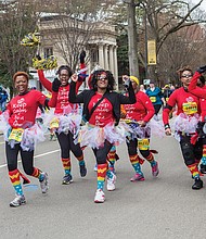 Many participants in the annual Monument Avenue 10K dress up — like this group in 2015 — to run or walk in the event. Participants have the satisfaction of meeting personal goals, getting some exercise and having fun.