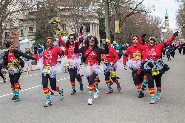 Many participants in the annual Monument Avenue 10K dress up — like this group in 2015 — to run or walk in the event. Participants have the satisfaction of meeting personal goals, getting some exercise and having fun.