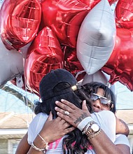 In memory and tears //
Danielle Bugg, left, mother of Mikkaisha, and Kennecia Williams, mother of Taliek, embrace.
Taliek’s funeral will be 1 p.m. Thursday, April 6, at Walter J. Manning Funeral Home, 700 N. 25th St., while services for Mikkaisha will be 1 p.m. Friday, April 7, at Worship & Praise Church, 3006 E. Laburnum Ave. 
Anyone with information about the shootings is asked to call Richmond Police Detective Joe Fultz at (804) 646-3929 or contact Crime Stoppers at (804) 780-1000.