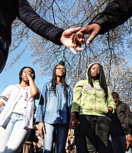 In memory and tears // About 200 people gather at a prayer vigil Sunday in Mosby Court for Mikkaisha D. Smoot, 16, and Taliek K. Brown, 15. The two were found fatally wounded shortly after 1 a.m. March 29 in front of an apartment building in the 1900 block of Accommodation Street in Mosby Court. A third person, an adult, is expected to recover from her non life-threatening gunshot wounds. 
An investigation continues into their deaths, which police have ruled as homicides. 
Mothers of the slain teens were joined at the vigil by family, friends and classmates of their children. The group joined hands, prayed and then released balloons in their memory following the vigil. 
