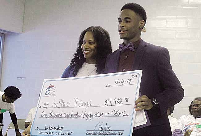 Chicago native and former Quentis Bernard Garth (QBG) Foundation Scholarship recipient, Tenisha Taylor Bell awards South Shore International College Preparatory Academy senior and student-athlete DeShawn Thomas with The Ezekiel Taylor Scholarship of $1,982, which represents the year Bell’s father died on the Southside of Chicago.