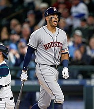 Houston Astros shortstop Carlos Correa (1) reacts after striking out with the bases loaded against the Seattle Mariners during the eighth inning at Safeco Field. Seattle defeated Houston 6-0. Mandatory Credit: Joe Nicholson-USA TODAY Sports