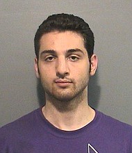 The photos of Tamerlan Tsarnaev were taken by the Cambridge PD in 2009 after his arrest on an assault charge. Tsarnaev died amid an explosive firefight in nearby Watertown after he was run over by an SUV driven by his brother. Dzhokhar Tsarnaev was arrested and convicted of carrying out the bombings, and he was sentenced to death in 2015.