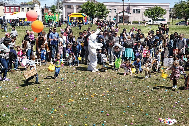 Ready, set, go hunt Easter eggs! // To cheer on youngsters in the 6-year-old and under category as they ran to fill their baskets from the colorful collection strewn across the grass. The Great Big Egg Hunt, sponsored in Jackson Ward by Center Church, also included an egg hunt for older children, games, bounce houses and food.