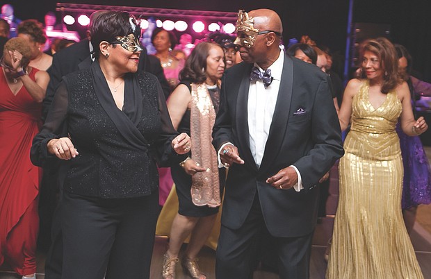 Celebrating VUU // The $200-per-person, black-tie benefit for VUU drew several hundred supporters who danced to the music of Trademark and wore masks and glitter