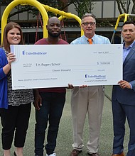Jillian Hamblin, COO, UnitedHealthcare Community Plan of Texas; Johnathan Joseph, Houston Texans; Dave Muzyka, Principal, T.H. Rogers; Rodolfo Guerra, Executive Director, UnitedHealthcare Community Plan of Texas with $11,000 donation from UnitedHealthcare to Houston Texans cornerback Johnathan Joseph’s Dreambuilders program.) 
